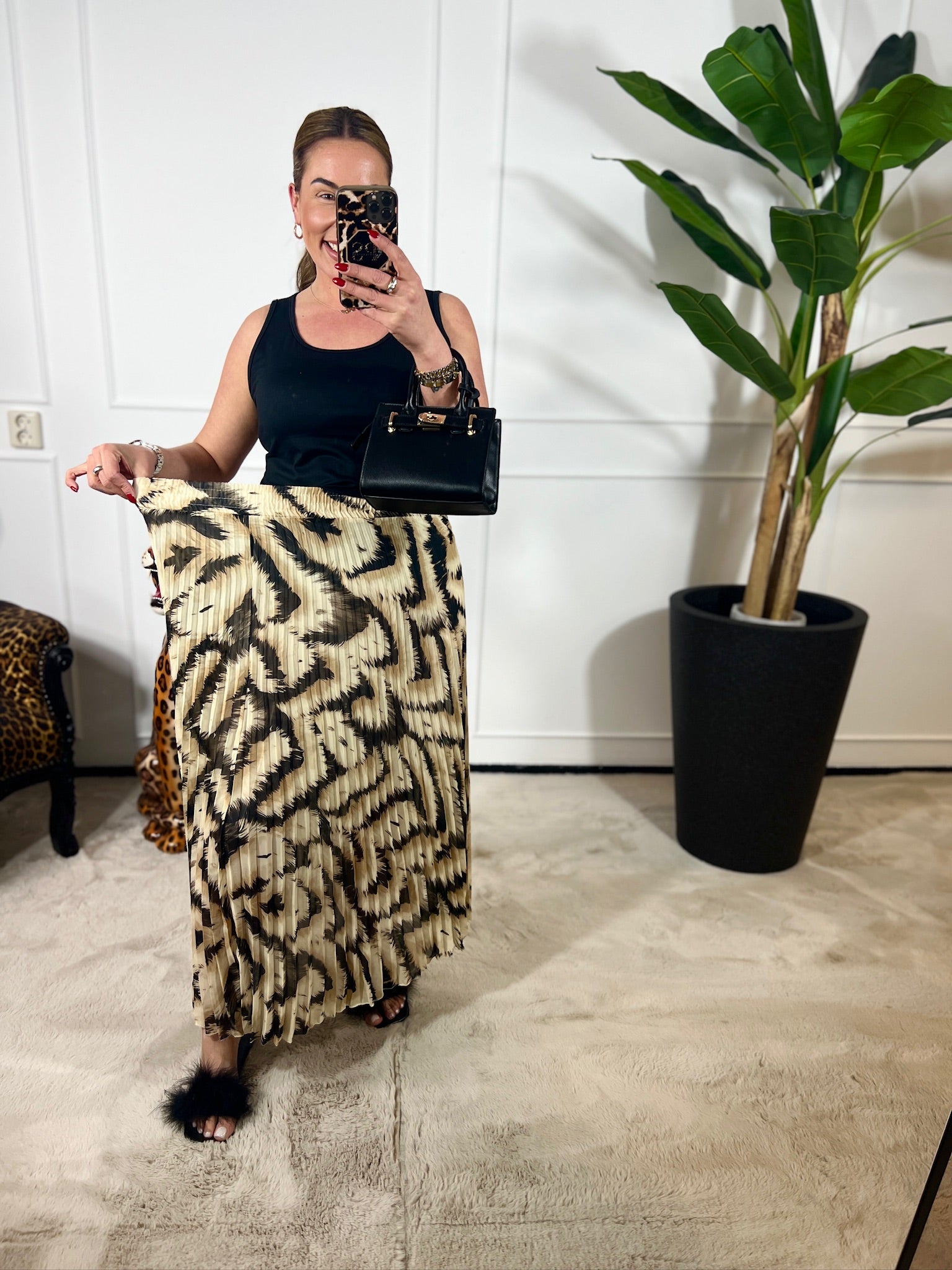LÉA PLEATED ANIMAL SKIRT