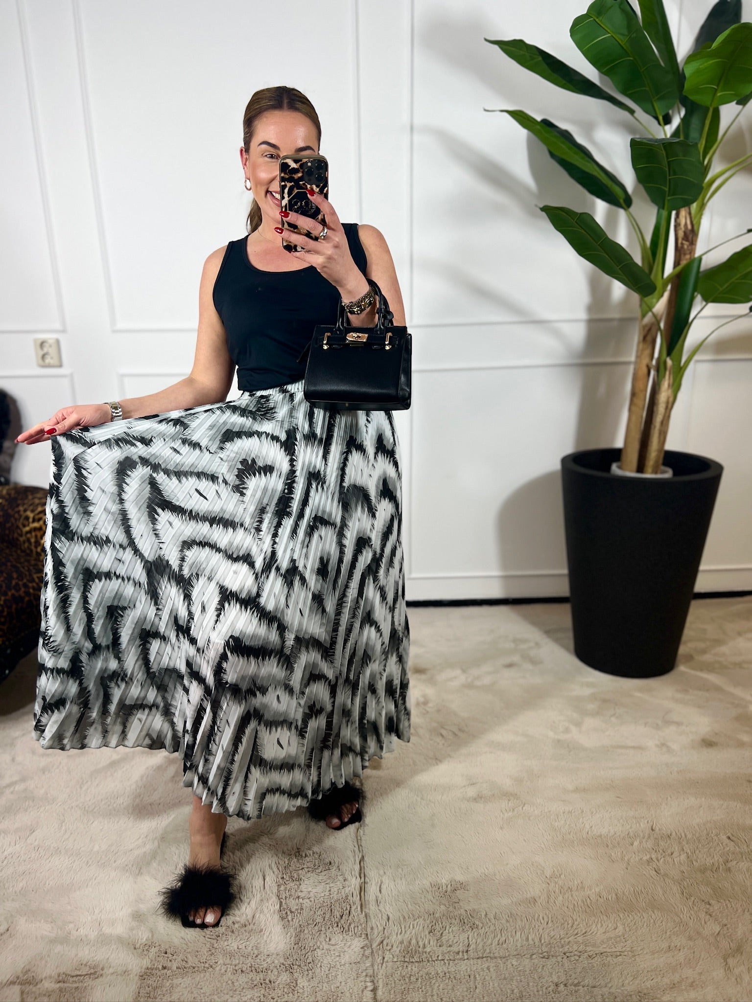 LÉA PLEATED ANIMAL SKIRT