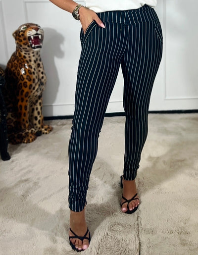 KRIJTSTREEP TRAVEL TROUSERS